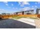 This backyard offers a patio, garden, lawn, and wooden fence, creating a private and enjoyable outdoor space at 19131 E 65Th Ave, Denver, CO 80249