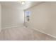 Neutral bedroom with carpet, a window, and an electrical outlet at 19131 E 65Th Ave, Denver, CO 80249