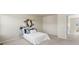 The spacious bedroom features carpeted floors, and a large window that offers natural light at 19131 E 65Th Ave, Denver, CO 80249