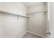 This is a large walk in closet with shelving and neutral carpet at 19131 E 65Th Ave, Denver, CO 80249