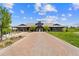Beautiful clubhouse with a long brick walkway, ideal for neighborhood events and community gatherings at 19131 E 65Th Ave, Denver, CO 80249
