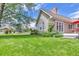 Lush backyard with landscaped lawn and outdoor seating area at 1019 24Th St, Golden, CO 80401