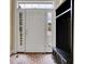 Bright entryway with white door and sidelights, brick floor and coat rack at 1019 24Th St, Golden, CO 80401