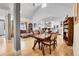 Open-concept living room with hardwood floors and vaulted ceilings at 1019 24Th St, Golden, CO 80401