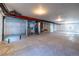 Unfinished basement with utilities and ample open space at 4580 S Ukraine Cir, Aurora, CO 80015