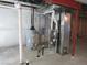 Basement utilities including a water heater, furnace and water filtration system at 4580 S Ukraine Cir, Aurora, CO 80015