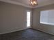 Bright bedroom with a door to the backyard at 4580 S Ukraine Cir, Aurora, CO 80015