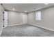 Finished bedroom with gray walls and carpet, recessed lights, and window to provide natural light at 3402 S Olathe Way, Aurora, CO 80013