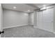 Finished bedroom with light gray walls and carpet, featuring white trim and closet space at 3402 S Olathe Way, Aurora, CO 80013