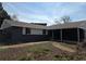 Ranch-style house boasting a freshly painted exterior, large windows, and potential for landscaping upgrades at 3402 S Olathe Way, Aurora, CO 80013