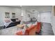 Inviting living space showcasing open floor plan, stylish furnishings, and plenty of natural light perfect for relaxation at 3402 S Olathe Way, Aurora, CO 80013