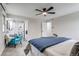 Bright and airy main bedroom with ensuite bath and serene design elements at 3402 S Olathe Way, Aurora, CO 80013