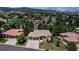 Aerial view of property showcasing the home, landscaping, and surrounding neighborhood at 6379 Spotted Fawn Run, Littleton, CO 80125
