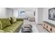 Finished basement with a comfortable lounge area featuring cozy seating and stylish decor at 6379 Spotted Fawn Run, Littleton, CO 80125