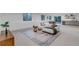 Spacious finished basement with a sitting area and wet bar at 6379 Spotted Fawn Run, Littleton, CO 80125