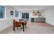 Finished basement with bar, dining area and walk out to yard at 6379 Spotted Fawn Run, Littleton, CO 80125