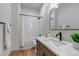 Well-lit bathroom with a modern vanity, sleek fixtures, and a clean, contemporary design at 6379 Spotted Fawn Run, Littleton, CO 80125