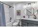 Bathroom with tub, shower, stylish vanity, and decorative touches at 6379 Spotted Fawn Run, Littleton, CO 80125