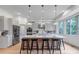 Bright, modern kitchen with island, stainless steel appliances, and lots of storage at 6379 Spotted Fawn Run, Littleton, CO 80125