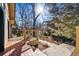 Wooden deck with stairs and a partial view of the backyard at 721 Monroe St, Denver, CO 80206