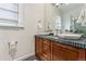 Bathroom vanity with dual sinks and custom tiled countertop at 721 Monroe St, Denver, CO 80206