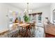 Bright and airy dining room with doors to backyard at 721 Monroe St, Denver, CO 80206