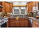 Kitchen featuring stainless steel appliances, granite countertops, and plentiful cabinet space at 721 Monroe St, Denver, CO 80206