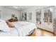 Bright bedroom with hardwood floors and a view of the backyard at 721 Monroe St, Denver, CO 80206