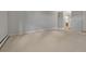 Spacious bedroom featuring neutral carpeting and access to an ensuite bathroom at 13991 E Marina Dr # 505, Aurora, CO 80014