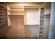 Walk-in closet featuring adjustable shelves and rods for optimal organization and storage at 13991 E Marina Dr # 505, Aurora, CO 80014