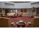 A spacious lobby featuring comfortable seating, tables, artwork, and natural light at 13991 E Marina Dr # 505, Aurora, CO 80014