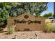 Attractive sign for Heather Gardens community with landscaping, lighting, and address display at 13991 E Marina Dr # 505, Aurora, CO 80014