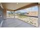 Covered patio with a view of neighborhood development with partial landscaping at 24707 E 40Th Ave, Aurora, CO 80019