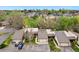 Aerial view of the home showcasing its layout, landscaping, and attached garages at 6305 W 6Th Ave # C17, Lakewood, CO 80214