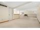 Finished basement with a cozy fireplace and ample space for recreation and relaxation at 6305 W 6Th Ave # C17, Lakewood, CO 80214