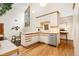 Bright kitchen with stainless steel appliances, light countertops, and seamless dining area access at 6305 W 6Th Ave # C17, Lakewood, CO 80214