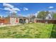 Expansive backyard featuring a patio area, gazebo, storage shed, and well-kept lawn for outdoor enjoyment at 2850 Roosevelt, Thornton, CO 80229
