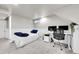 Finished basement bedroom features a bed, desk, and neutral decor at 2850 Roosevelt, Thornton, CO 80229