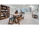Finished basement with a table, chairs, and entertainment area at 11905 Sea Oats St, Parker, CO 80138