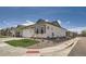 Well-maintained home featuring manicured landscaping, a two-car garage, and a charming exterior design at 11905 Sea Oats St, Parker, CO 80138