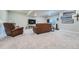 Comfortable finished basement living room with neutral carpet and recessed lighting at 11905 Sea Oats St, Parker, CO 80138