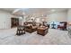 Cozy finished basement living room showcasing plush seating and neutral carpet at 11905 Sea Oats St, Parker, CO 80138