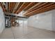 Unfinished basement ready for customization, offering ample potential for storage or additional living space at 827 Sundance Ln, Erie, CO 80516