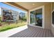 Covered patio perfect for outdoor relaxation, with a view of the backyard and surrounding neighborhood at 827 Sundance Ln, Erie, CO 80516