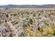 Home with solar panels, fenced yard and mountain views in community at 8008 W Spanish Peak, Littleton, CO 80127