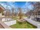 Large backyard with green grass and privacy fence at 8008 W Spanish Peak, Littleton, CO 80127
