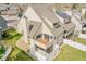 Aerial view of backyard with deck, patio, and privacy fence at 8008 W Spanish Peak, Littleton, CO 80127