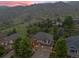 Stunning aerial view of the home showcasing its prime location with mountain views at 19061 Eagle Ridge Dr, Golden, CO 80401