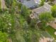 Scenic backyard with lush landscaping, mature trees, and well-maintained grounds, offering privacy at 19061 Eagle Ridge Dr, Golden, CO 80401