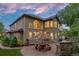 Large backyard patio perfect for outdoor entertaining with a privacy wall and ample seating at 19061 Eagle Ridge Dr, Golden, CO 80401